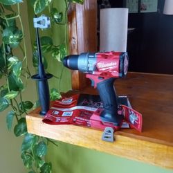 Milwaukee. 18 V. New.  Fuel.  Hammer Drill.   2 Speed.   1/2".  W/  Handle 