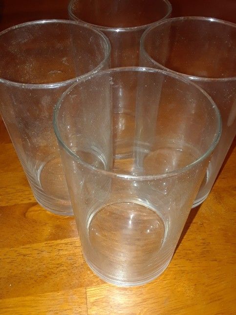 Four Glass Candle Holders...