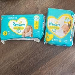 Pampers Diapers - Size NB - 62 Total 