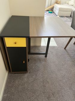 Drop leaf space saving table