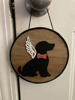 Dog with Angel wings sign