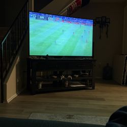 TV Phillips 65” With TV Stand.