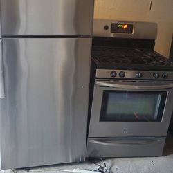 Frigidaire stove ..GE fridge..great condition  warranty  ready to deliver both item $850