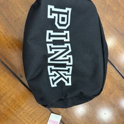 Brand new pink cosmetic bag. Comes with plastic lining. comes from a smoke free home. Any questions feel free to ask.