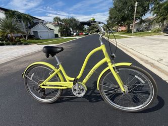 lime/kiwi-colored Electra Townie 7D EQ Step-Thru bike