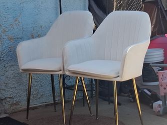 Two  white chairs