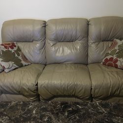 Faux Leather Full reclining sofa and Loveseat. 