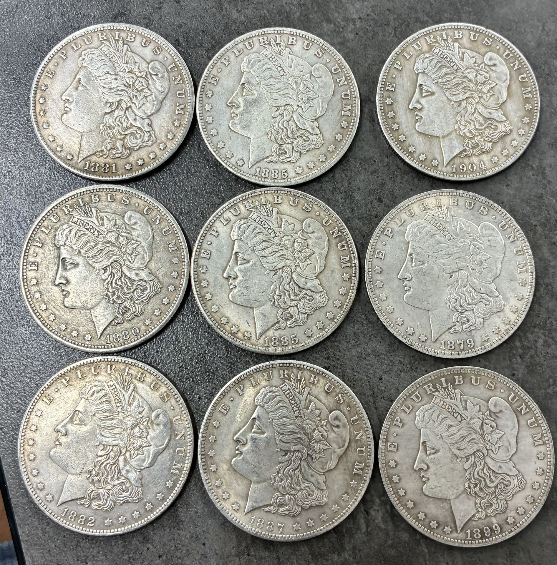 9 Morgan Silver Dollars