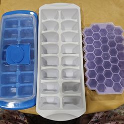 New, never used ice trays with covers