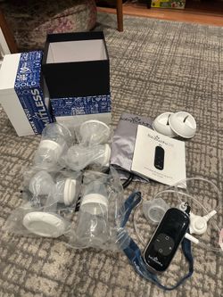 Baby Buddha Breast Pump - NEW / Unused
