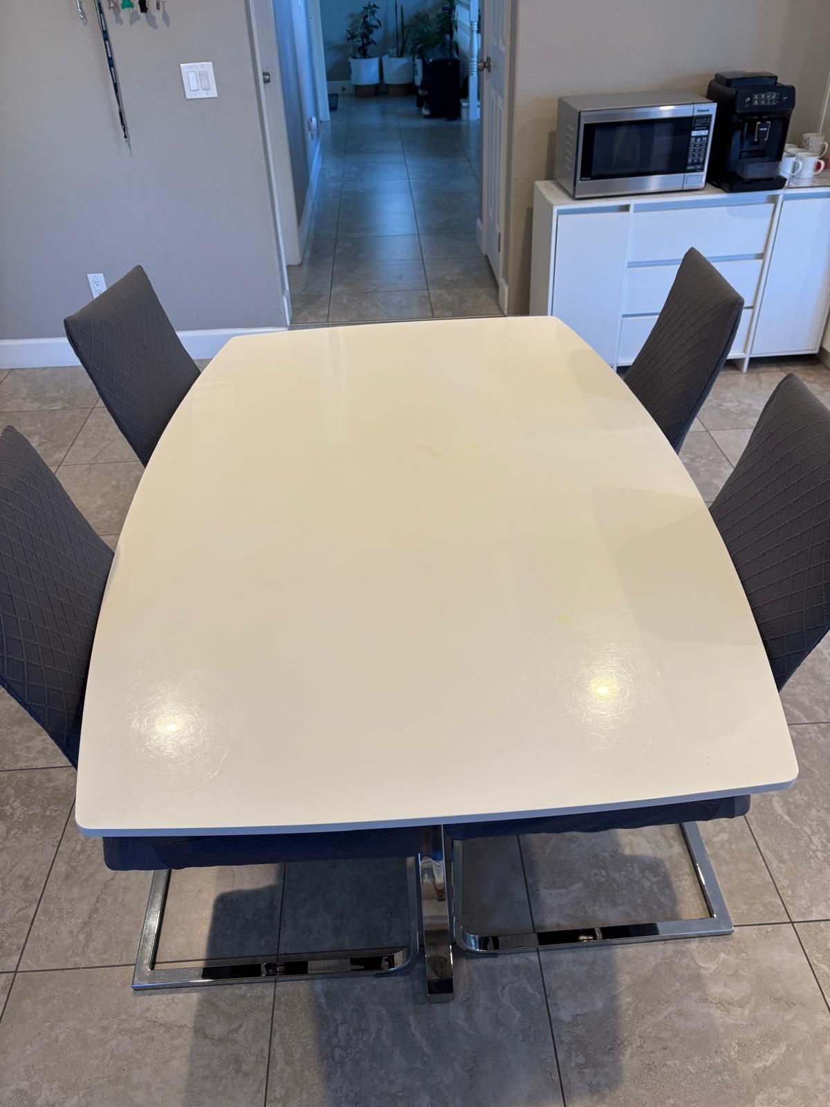 Stainless Steel Framed Dining Table With 4 Chairs