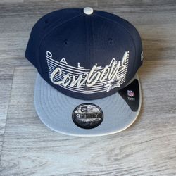 Cowboys Snapback Hat$35