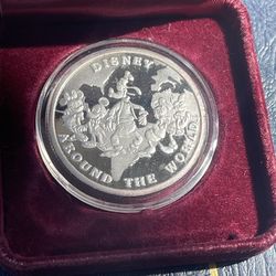 DISNEY COIN - DISNEY AROUND THE WORLD-  ONE TROY OUNCE - RARITIES MINT