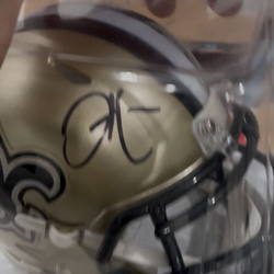 New Orleans Saints autographed mini helmet
