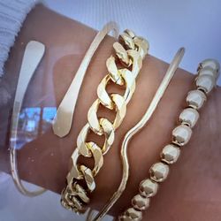 4 gold tone bracelet