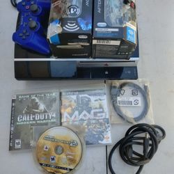 PS3  With 3 Controllers And 3games