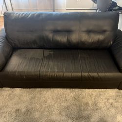FREE Leather Couch up for grabs!