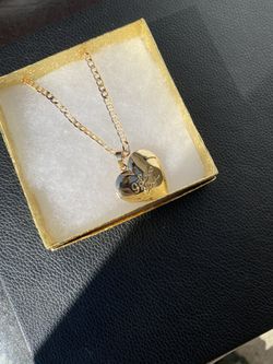 $15 Dije con Cadena Oro Laminado Santa Ana 