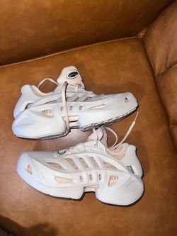 Excellent nearly new condition..These are the adidas adiFOM Climacool sneakers in a wonder beige colorway, featuring a sculpted bio-based foam cage ov