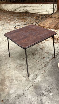 Folding card table, easily stowed.