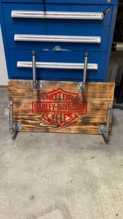 Motorcycle helmet hangers