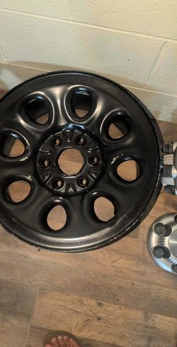 Black Chevy rim set with caps