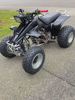 Black ATV Four Wheeler Quad Bike