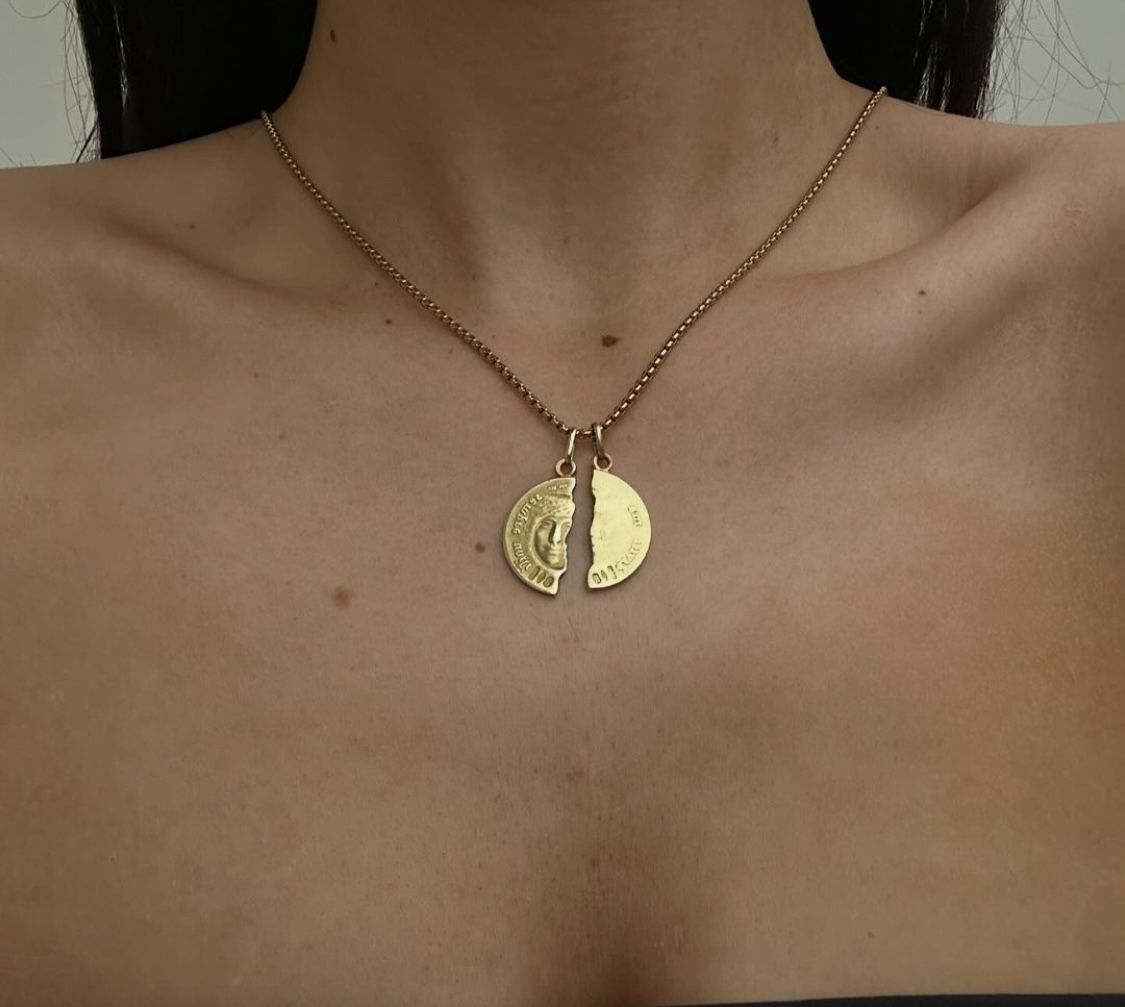 Brand new 18CT Solid Gold Italian designed pendant. is a beautiful rare find and one of a kind. It has never been worn and both halves are complete.