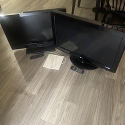 Two Flat TVs with remotes.