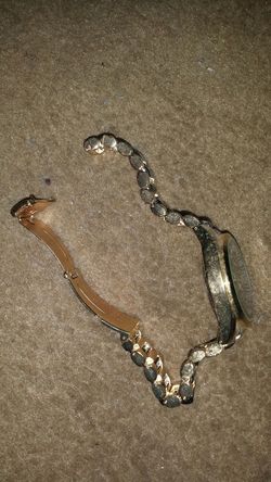 Gold plated genova brand watch broken pin