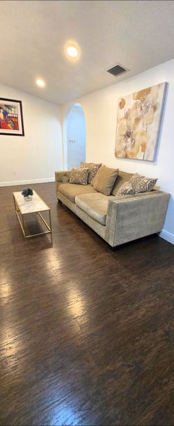 Loveseat and sofa with coffe table