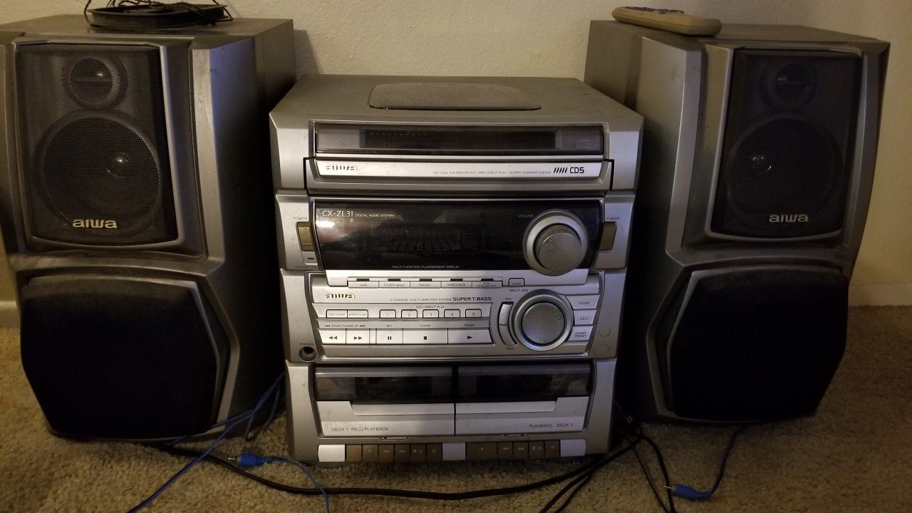 LOUD Aiwa Stereo System - 5 cd changer, 2 cassette players, 2 speakers, remote