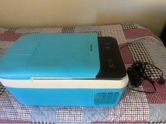 Portable fridge & freeze It works only at home and does not work in the car.