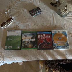 sonic generations, ghost recon wildlands, spider man ps4, and mario and sonic at the olympic games