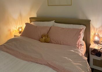 bed + mattress + comforter and sheets and two night stands