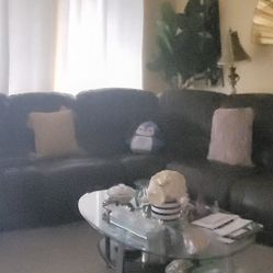 Leather recliner couch From ashley furniture. Dark brown comes with USB In  It