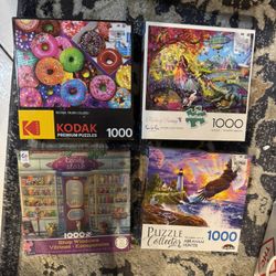 4 Brand New 1000-Piece Jigsaw Puzzles 