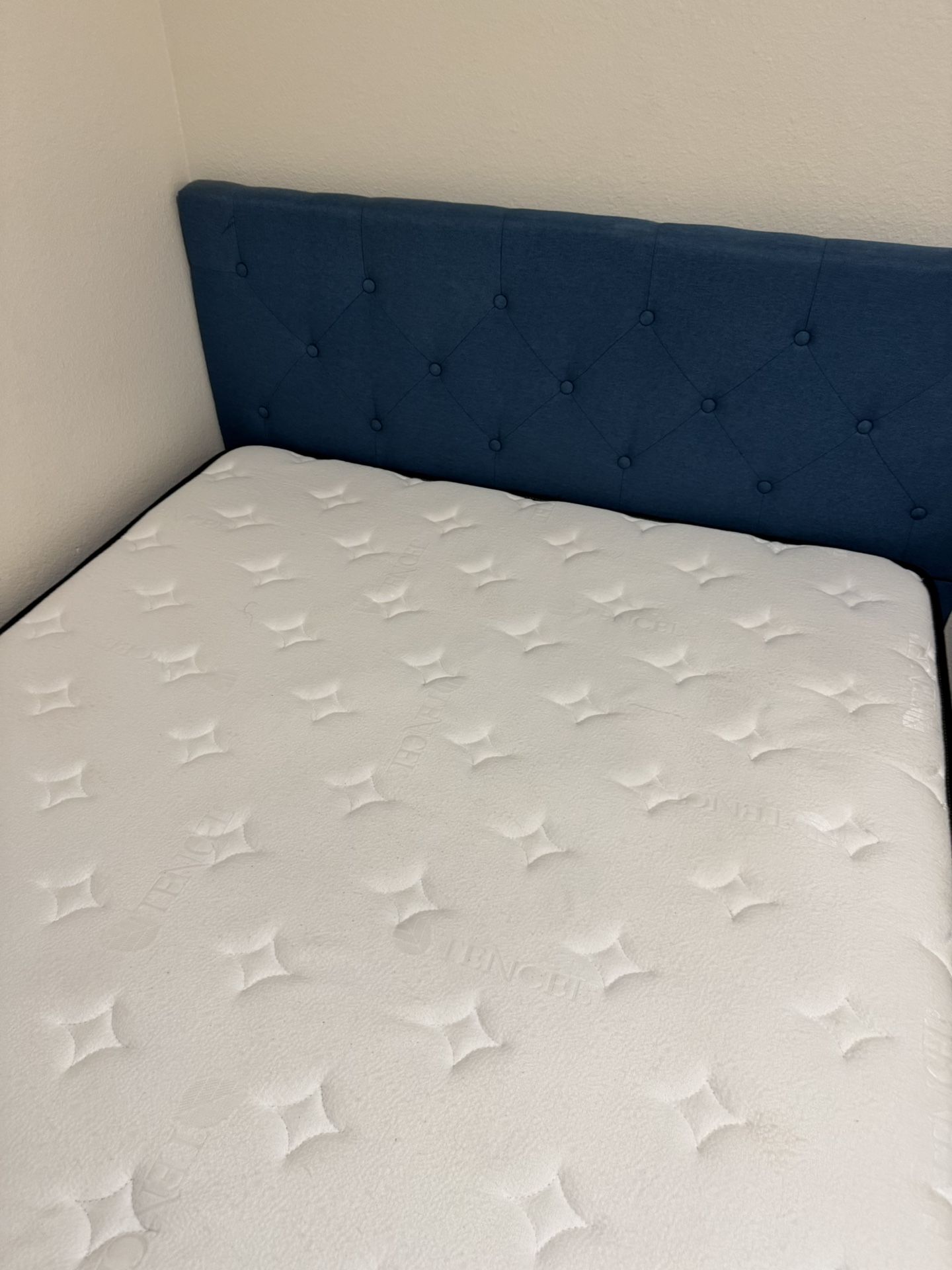 The mattress and bed frame don’t show any noticeable signs of use.