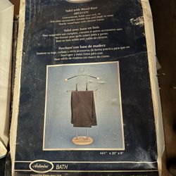 Air wire Tower Valet With A Wood Base