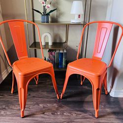 Pair Of Metal Orange Chairs 