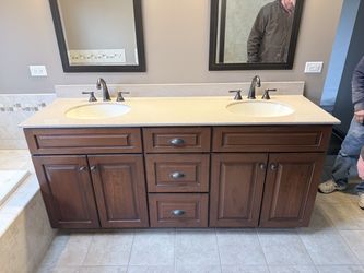 Vanity with sink top and faucets