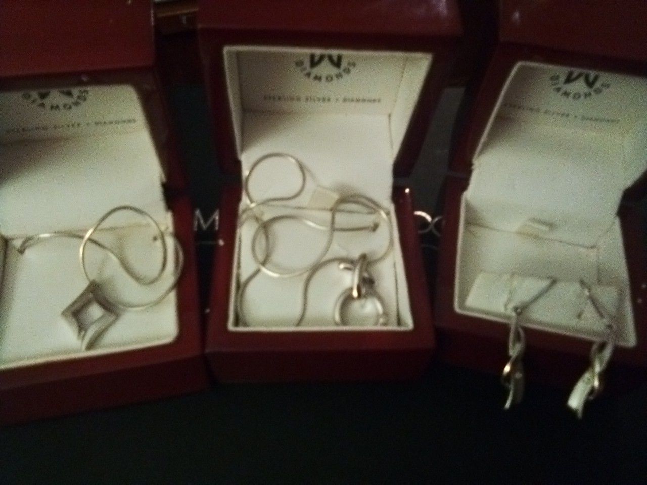 New Sterling Silver necklaces and earrings with diamonds