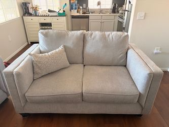Brand New Gray Loveseat !