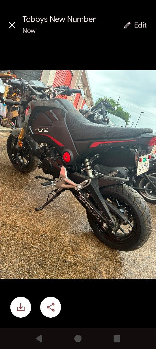 It's a Honda Grom Red And Black