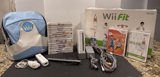 Nintendo Wii console bundle with accessories and games RVL-001