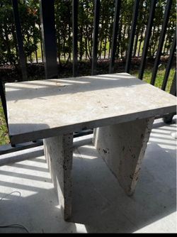 Outdoor travertine table