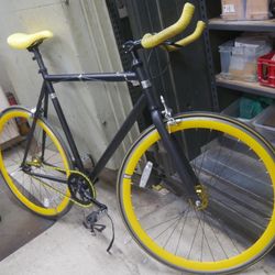 REPUBLIC ARISTOTLE FIX GEAR BLACK AND YELLOW BIKE SUGINO SPOCKET , RADIUS BRAKES, LARGE FRAME PRE OWNED 868674-1 