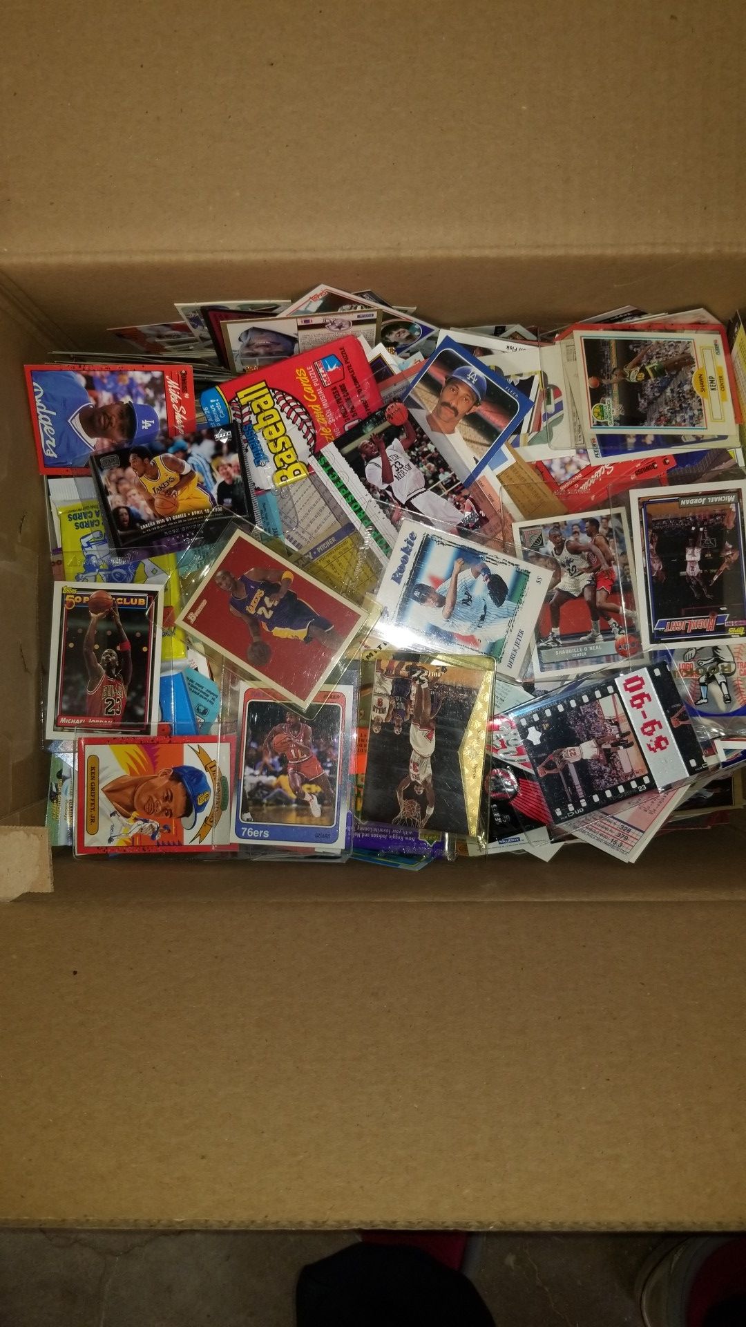 Sports cards- huge basketball cards , football cards , baseball cards around 20lbs, packs unopened. Lot # 010