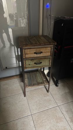 Small table with two drawers and under