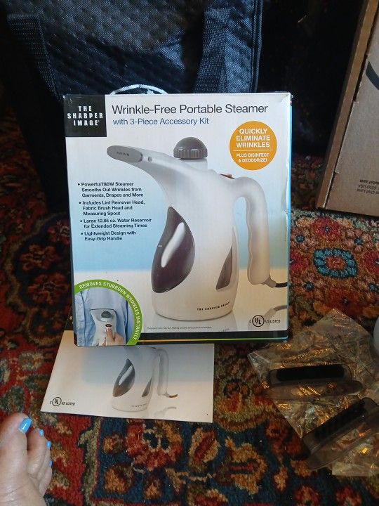 Portable Steamer. The Sharper Image.
